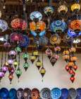 Greece, Crete, Chania, Old Town. Tourist Souvenirs. Colored glass lamps and colorful bowls. Art Print